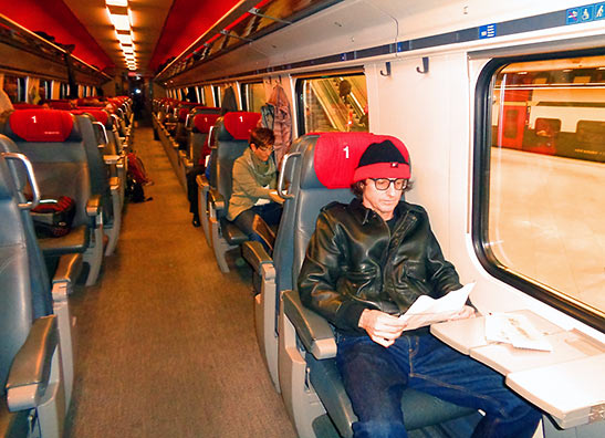 writer on a train to Lausanne