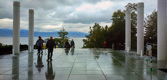 the Olympic Museum with Lake Geneva in the background