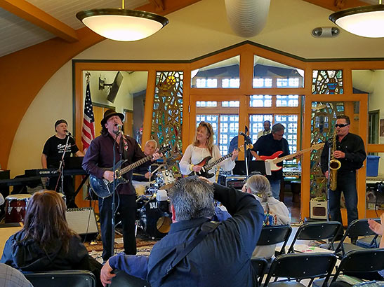 John January and Linda Berry perform with friends at the 'Doors of Change' benefit