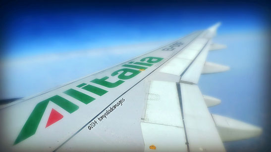 starboard wing of Alitalia liner