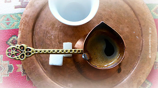 small copper pot of Bosnian coffee