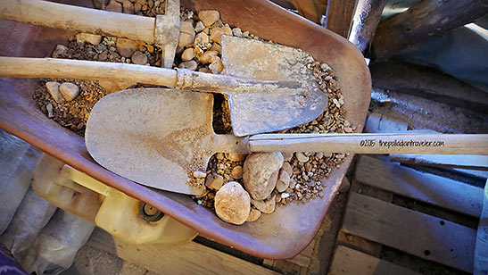 shovels and wheelbarrow inside the Tunnel of Hope