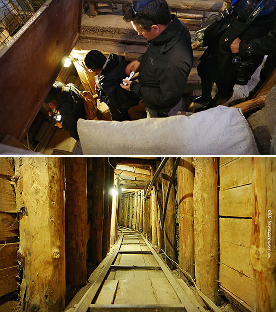 visitors stepping down into the Tunnel; the Tunnel itslef
