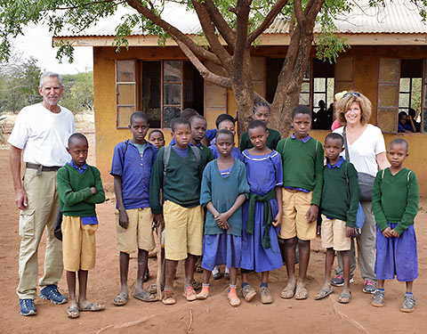 writer with children at a school near Arusha, Tanzania