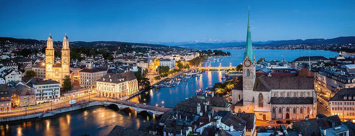 Zurich by night with panoramic view over the whole lake basin.
