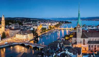 Zurich by night with panoramic view over the whole lake basin.