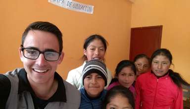 the writer with students from his weekly English workshop