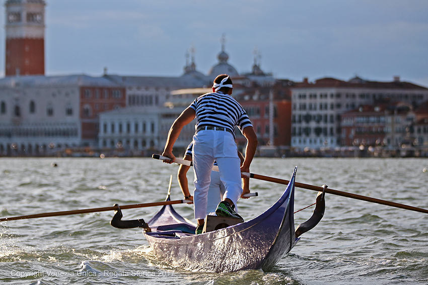 rowers on a gondola, Venice