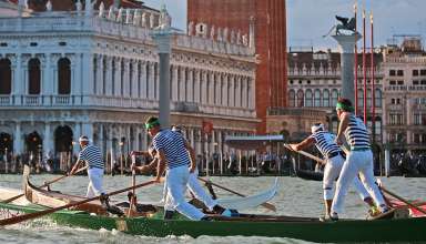 rowers and gondolas at a regatta, Venice