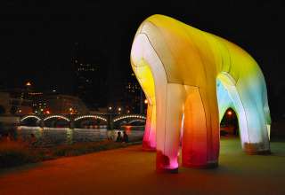 the inflatable sculpture “Light Cave” at Ah-Nab-Awen Park on the Grand River, at night