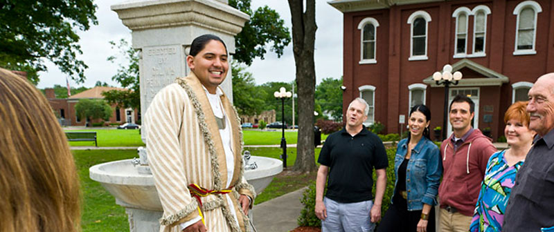 Cherokee Nation tour guide with visitors