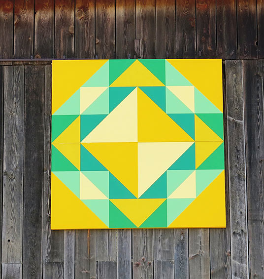 corn and beans block on a barn door