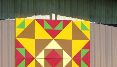 colorful block at a barn on the Rohrer property honors six tribes of Native Americans