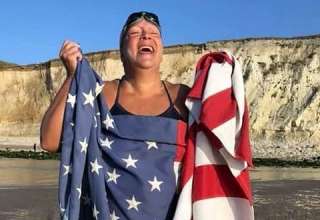 Diana Qualls Corbin with U.S. flag