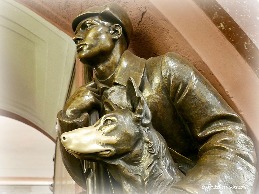 sculpture of a frontier guard and his dog