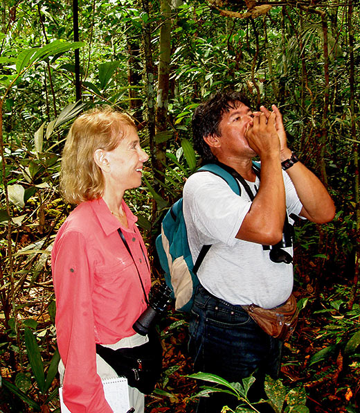 travel guide Souza imitating a bird call
