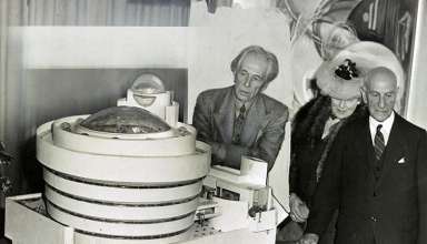 Frank Lloyd Wright with a model of the Guggenheim Museum, 1945