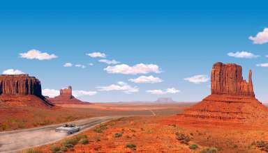 Road Trippers navigate their car through majestic John Ford Country