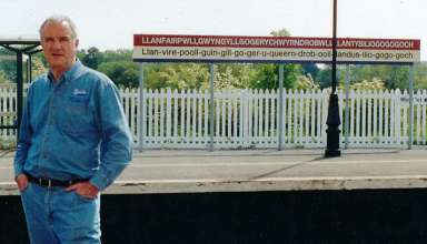 John Clayton on Welsh train station platform