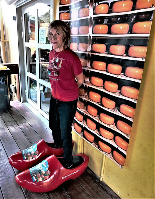 writer in giant clogs, Amsterdam Cheese and Liquor Store, St. Maarten