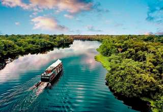 boat cruising the Amazon River