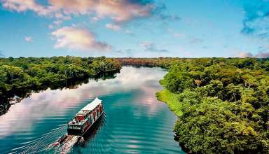 boat cruising the Amazon River