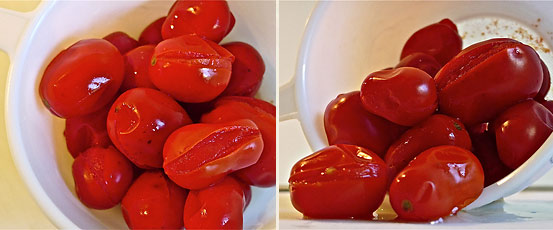 split cherry tomatoes in a hand-held strainer