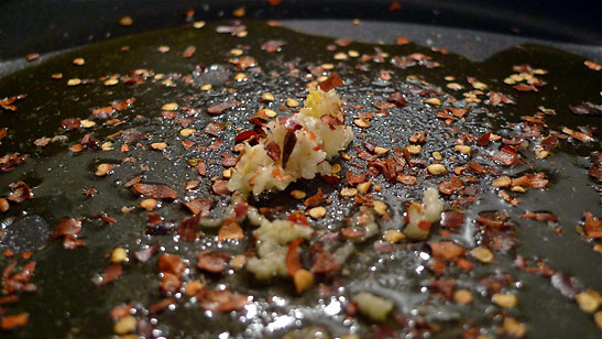 garlic, pepper, sea salt stir-frying in olive oil
